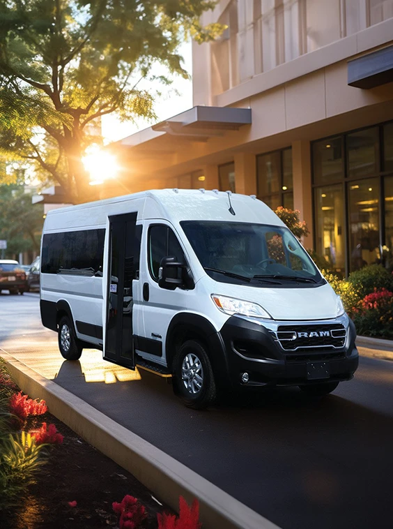 white shuttle accessible van parked in front of a retirement home