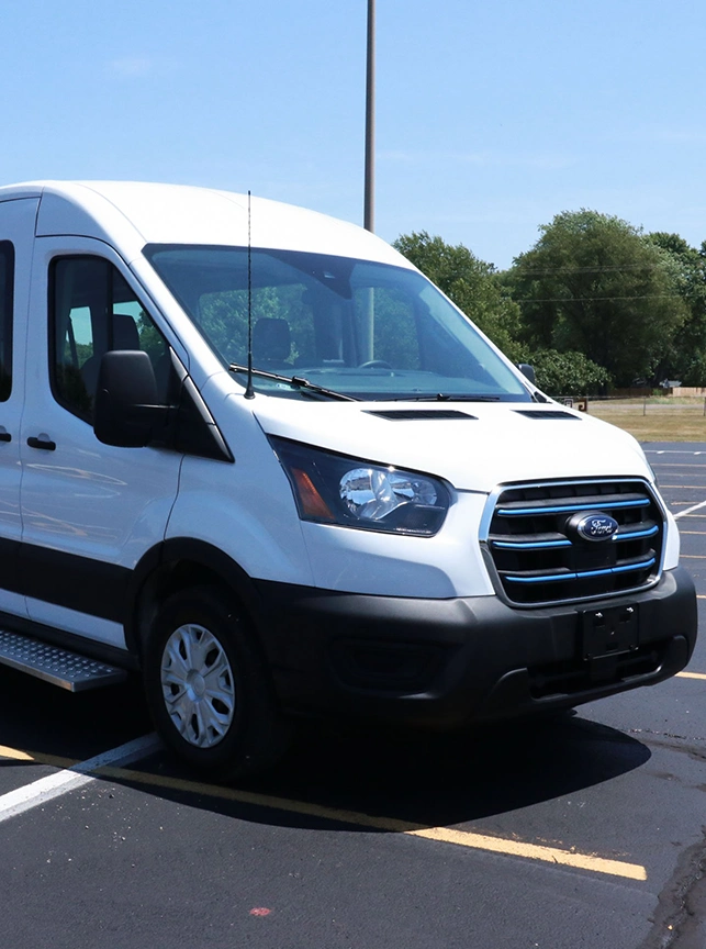 front of a white passenger van